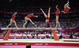 american-gymnast-alexandra-raisman-can-be-seen-dismounting-from-the-balance-beam